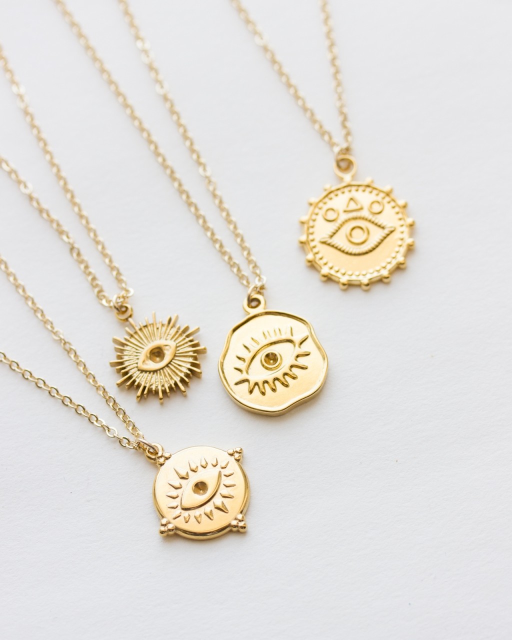 Eye discount gold pendant