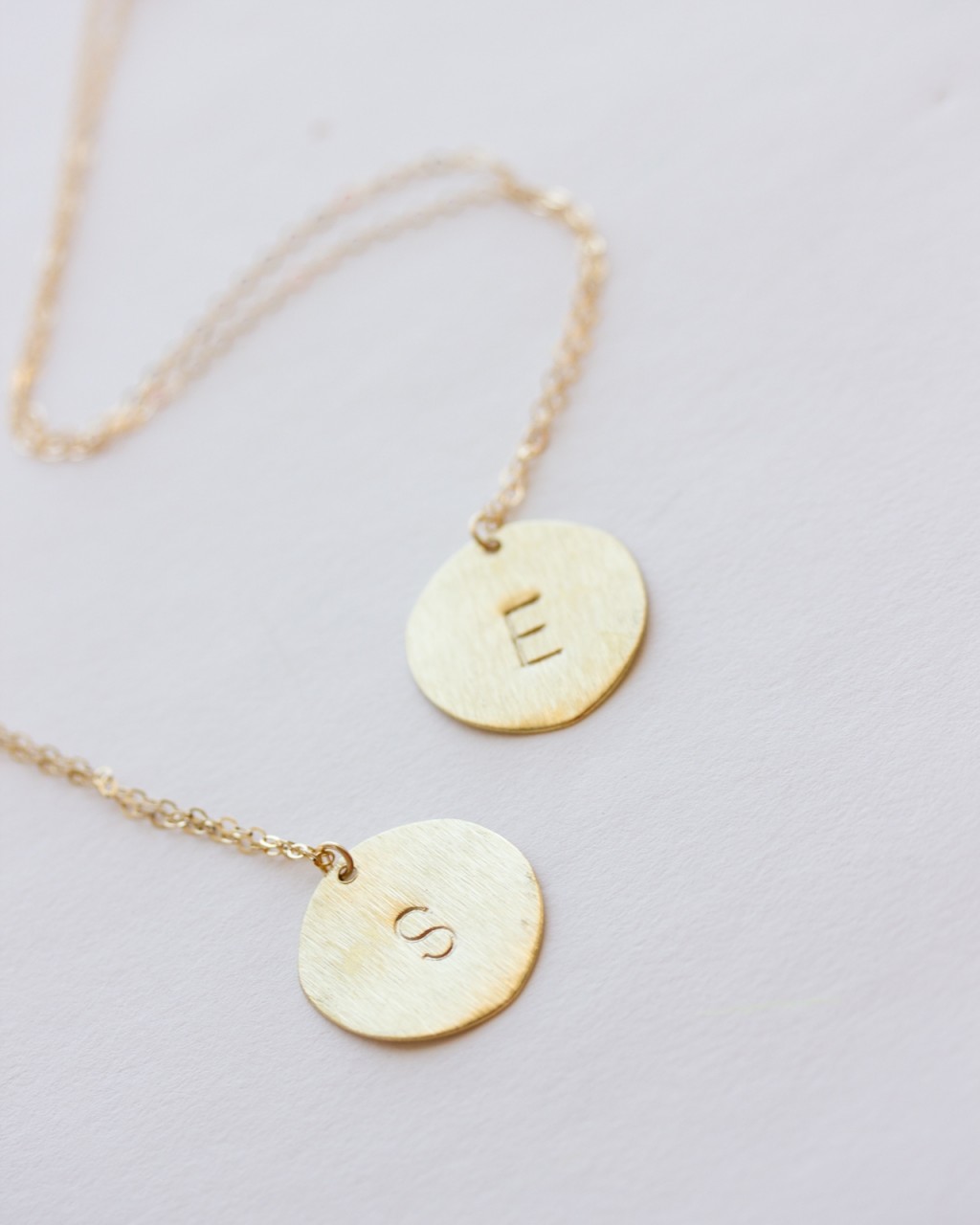 Long initial outlet necklace