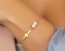 Sideways cross bracelet, pearl bracelet, wedding, gold cross bracelet, white pearl bracelet,bridesmaid bracelet, gold filled cross,"Kastalia